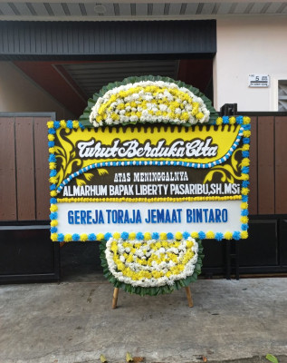 Papan Bunga Duka di Bale